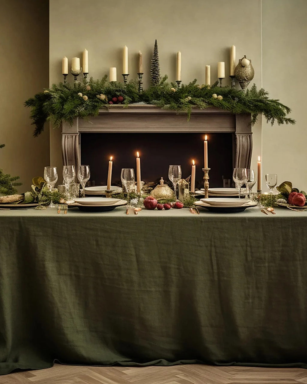 Olive green stonewashed linen tablecloth on a dining table set for a festive dinner (supplier photo)