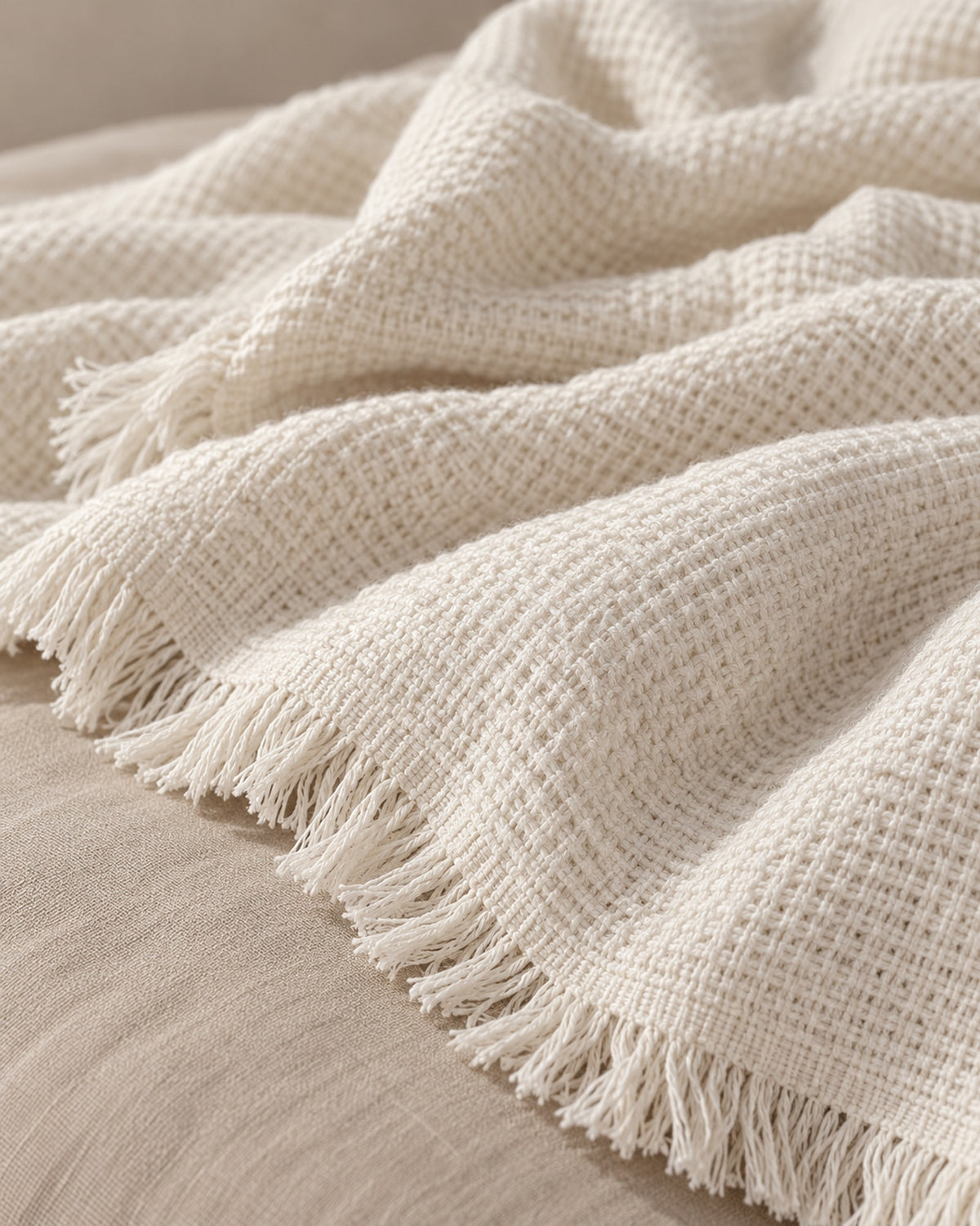 Close-up of the waffle weave and frayed fringe edge.