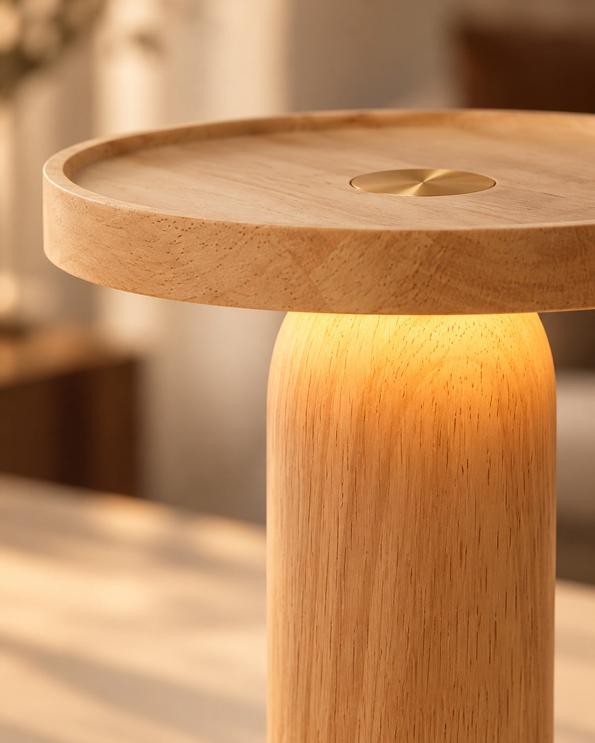 Close-up of the wood grain where the round top meets the glowing body.