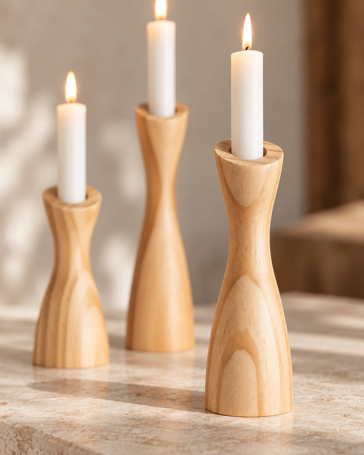Close-up of the turned wood grain and curved profile of a candle holder.